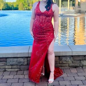 Beautiful Red prom dress by COLORS size 14. Only worn once.